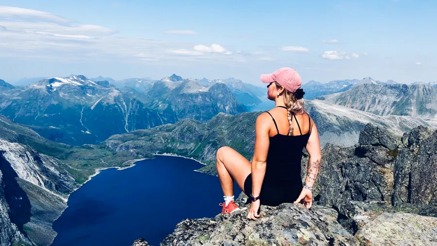 norway travel woman hiking active lifestyle mountain nature